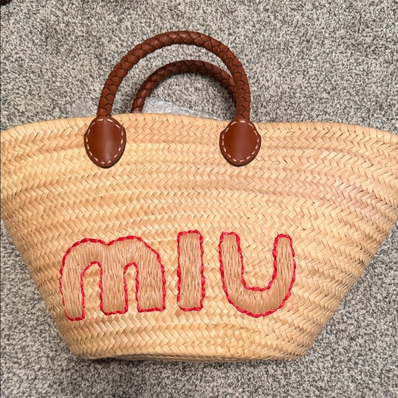 Miu Miu Handbags - Miu Miu Straw Tote with Red Embroidered Logo and Brown Braided Handles